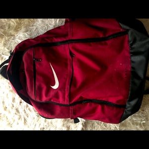 Red Nike slides and book bag bundle
